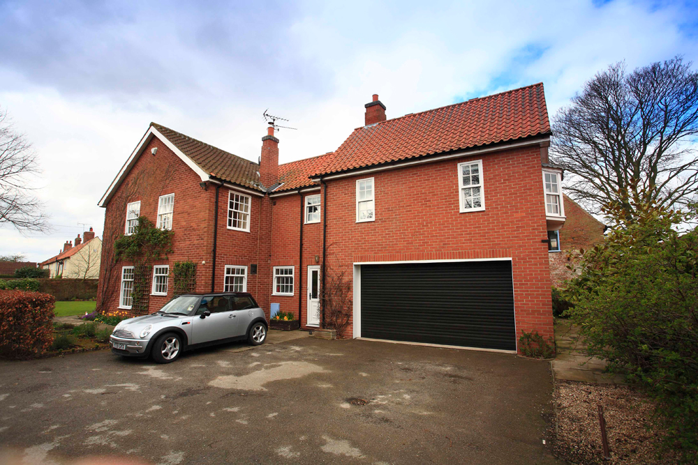 Black garage door in House