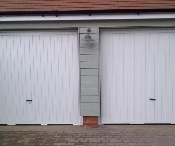 Two Steel White Garage Doors