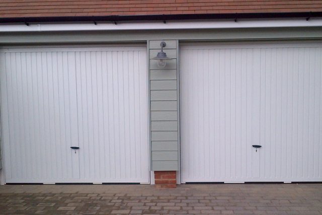 Two Steel White Garage Doors